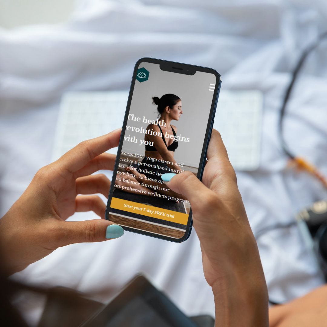 a cell phone showing a woman doing yoga